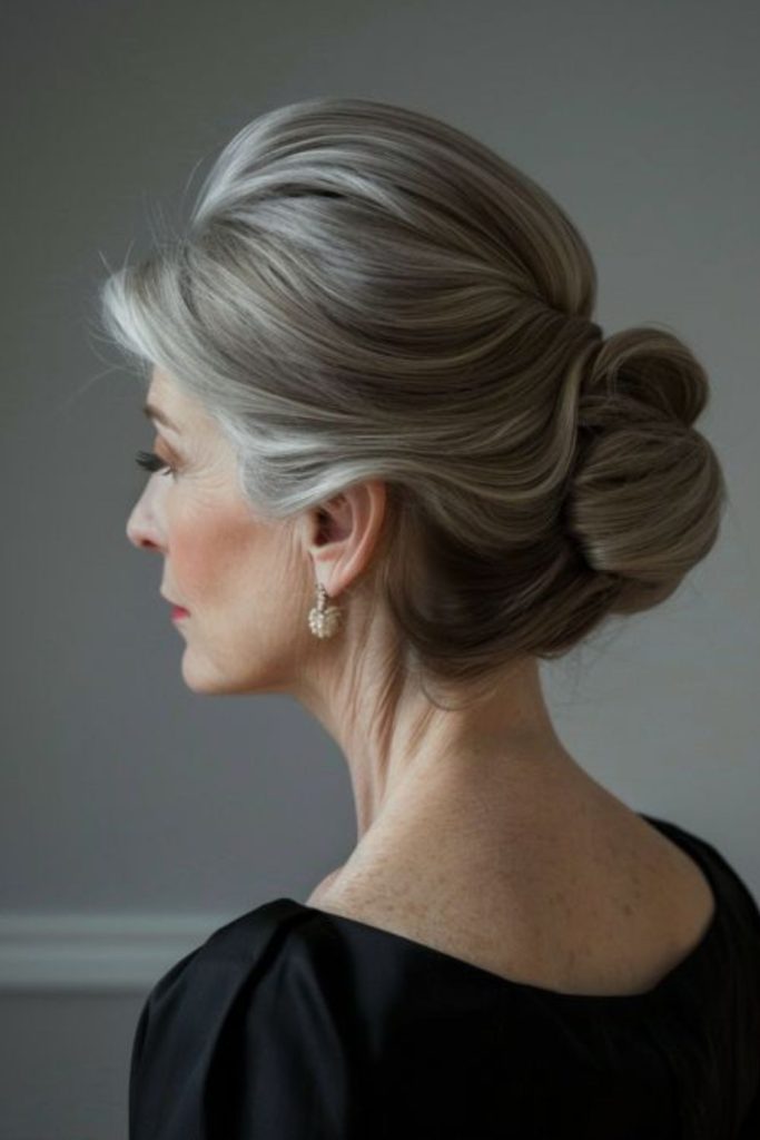 Low chignon with elegant pearl pins