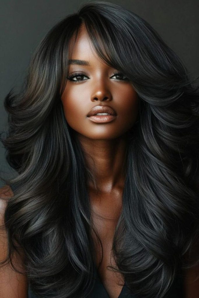 Raven-black curtain straight hair.