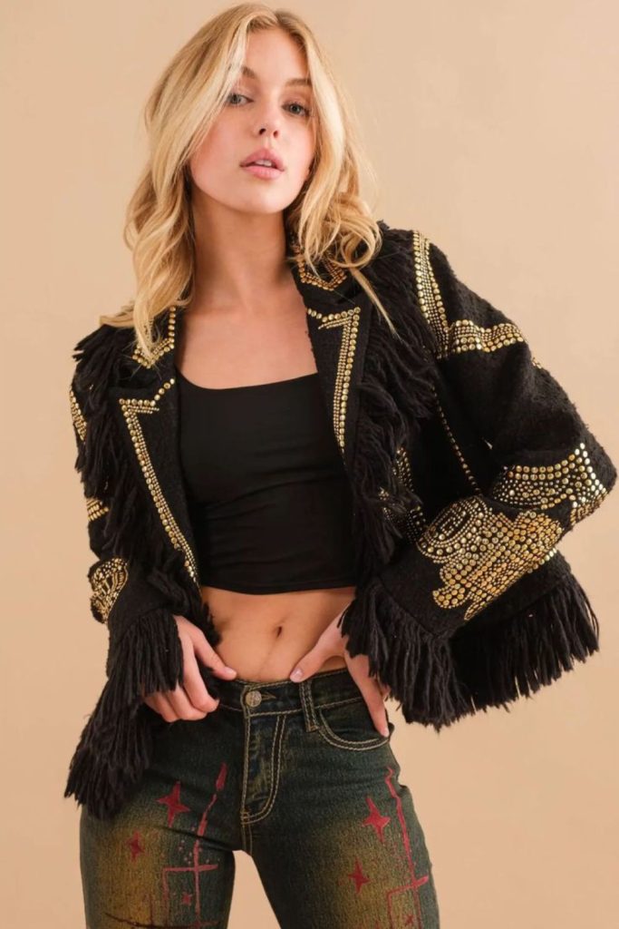 Sequin fringe top and black jeans.