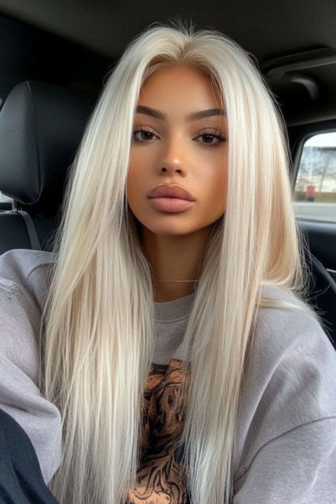 Vanilla chrome smooth sleek hairstyle look.