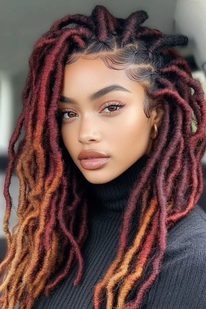 Maroon twist-out glowing with definition.