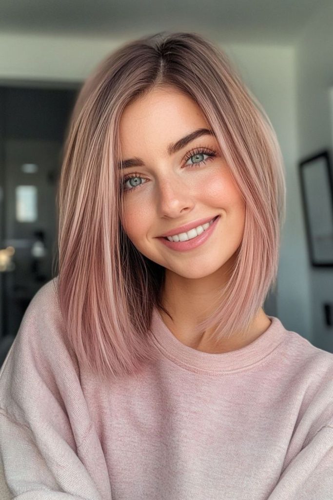 Pink-toned lob with delicate waves