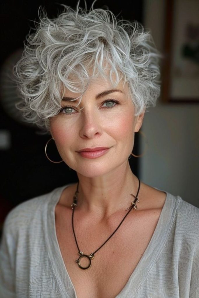 Curled fringe pixie feminine look.