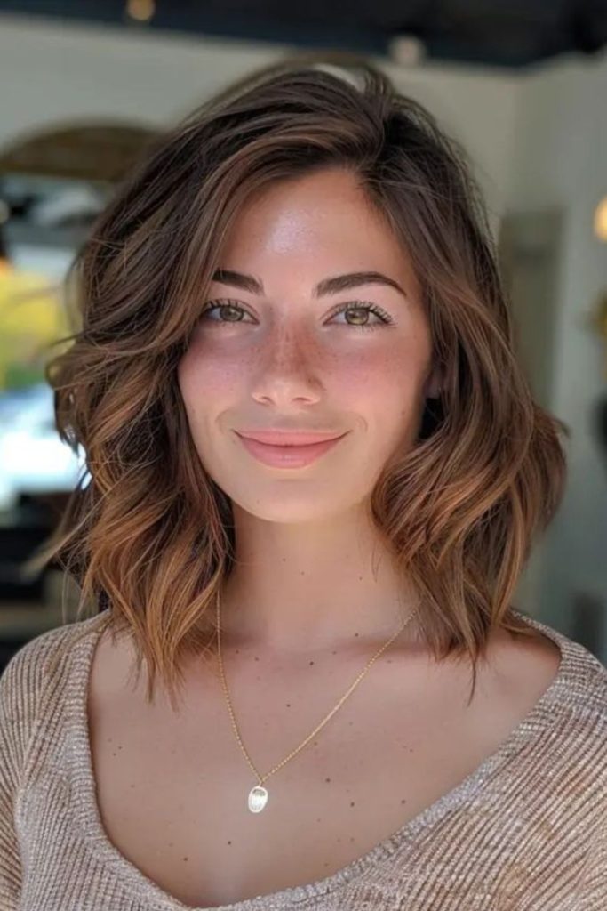 Golden brown windswept bob with layers