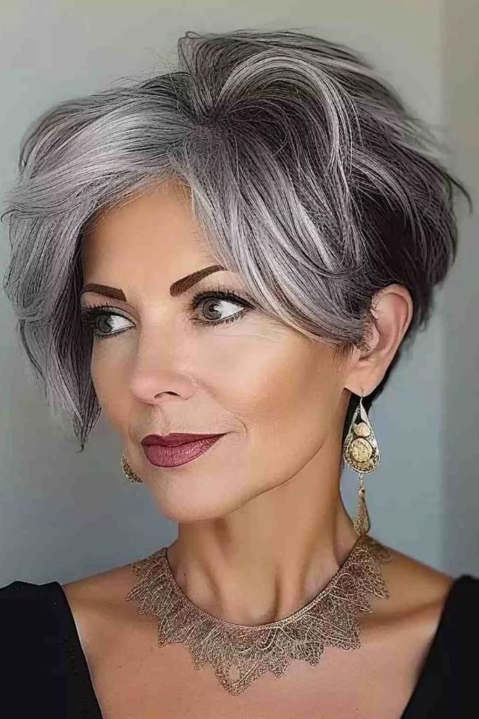 Feminine wavy fringe pixie.