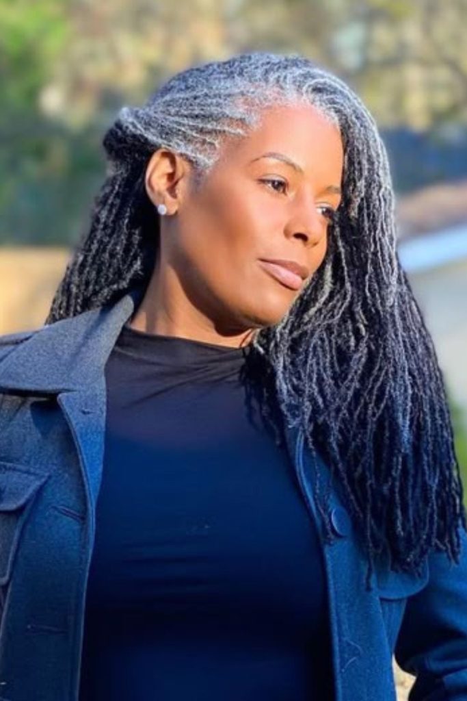 Blue-black locs flowing like ocean waves