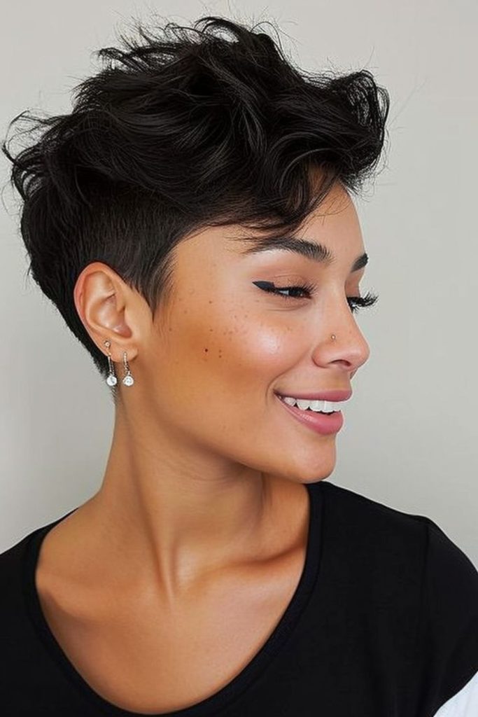 Gentle tapered pixie with soft curves.