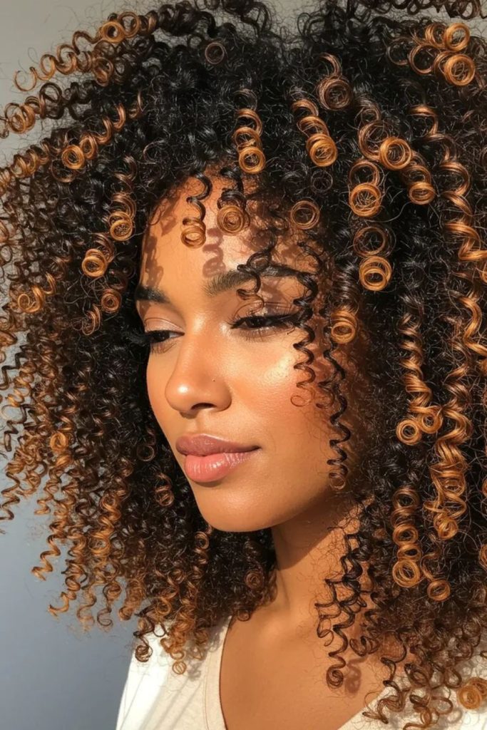 Golden spirals falling over shoulders naturally