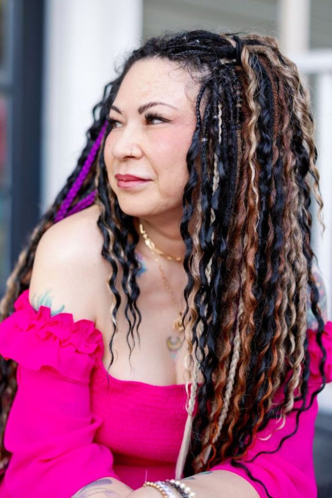 Deep charcoal locs with violet undertones