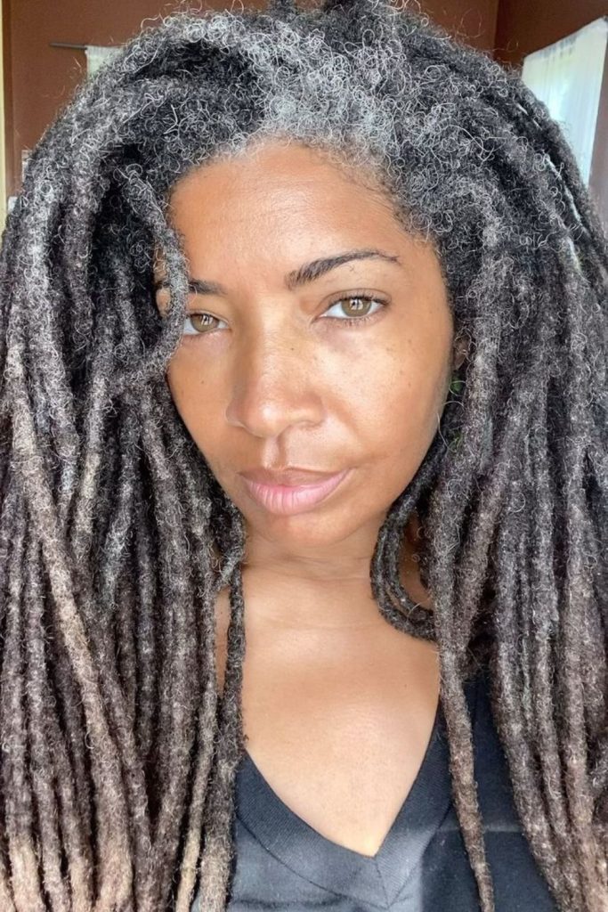 Soft gray-lavender locs with floating motion