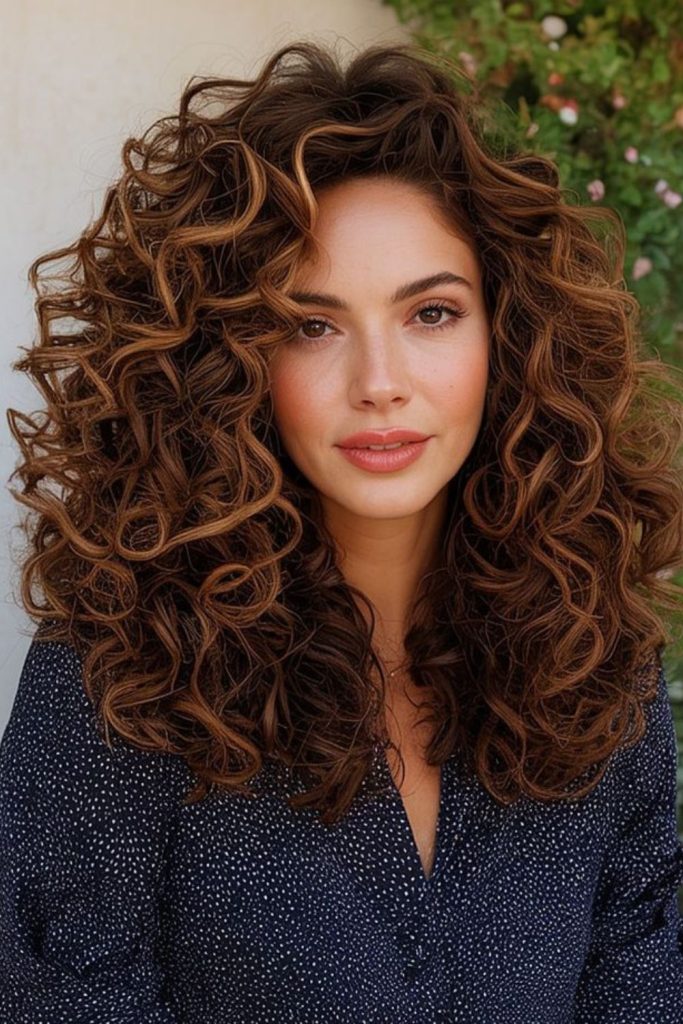 Expansive curls like wildflower bloom