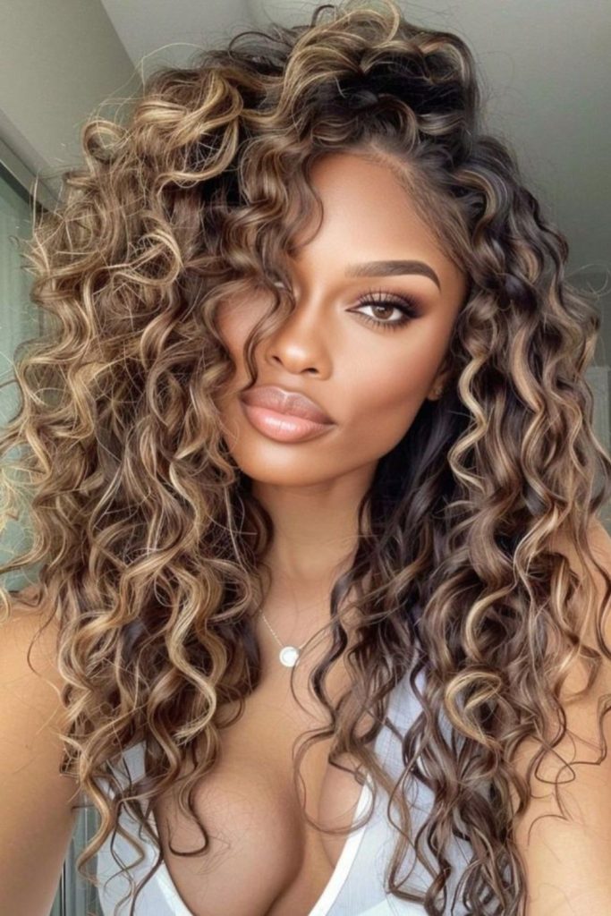 Soft apricot curls flow freely