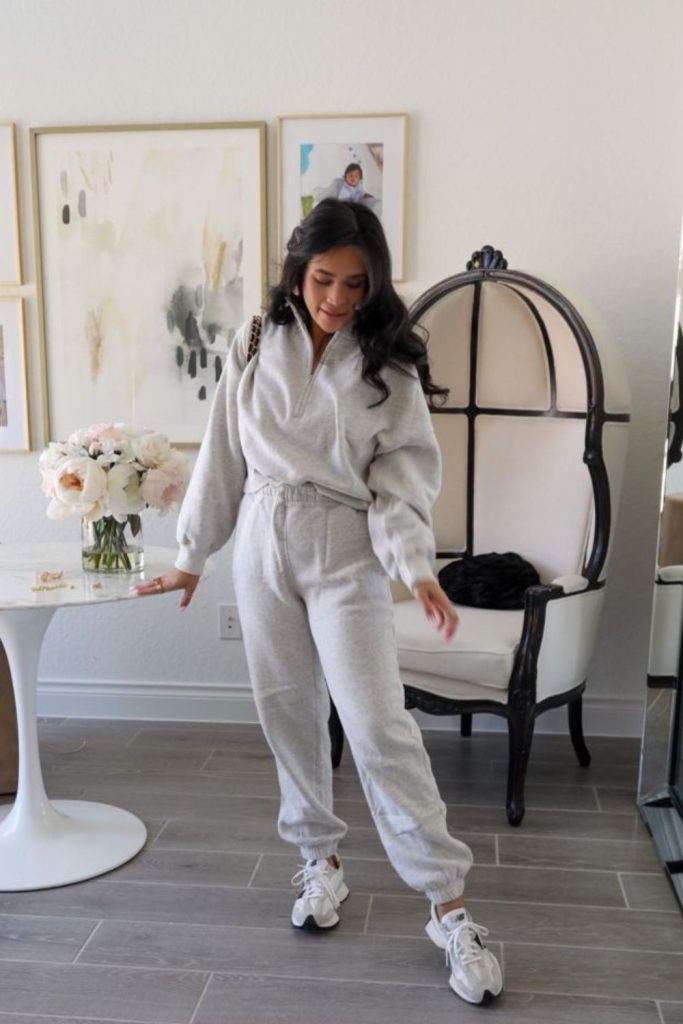 Smoky gray sweatsuit modern relaxed look.