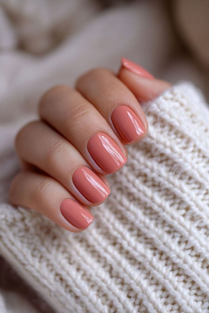 Blanched peach clean short nails.