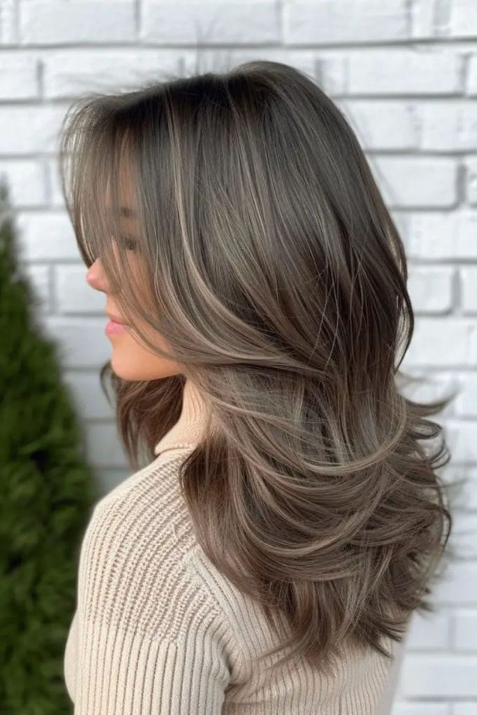Ash-toned mid-length hair with soft layers