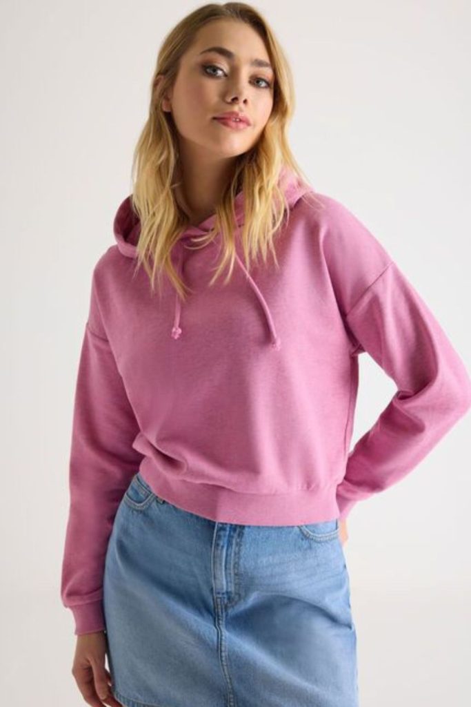 Bubblegum pink hoodie with denim skirt
