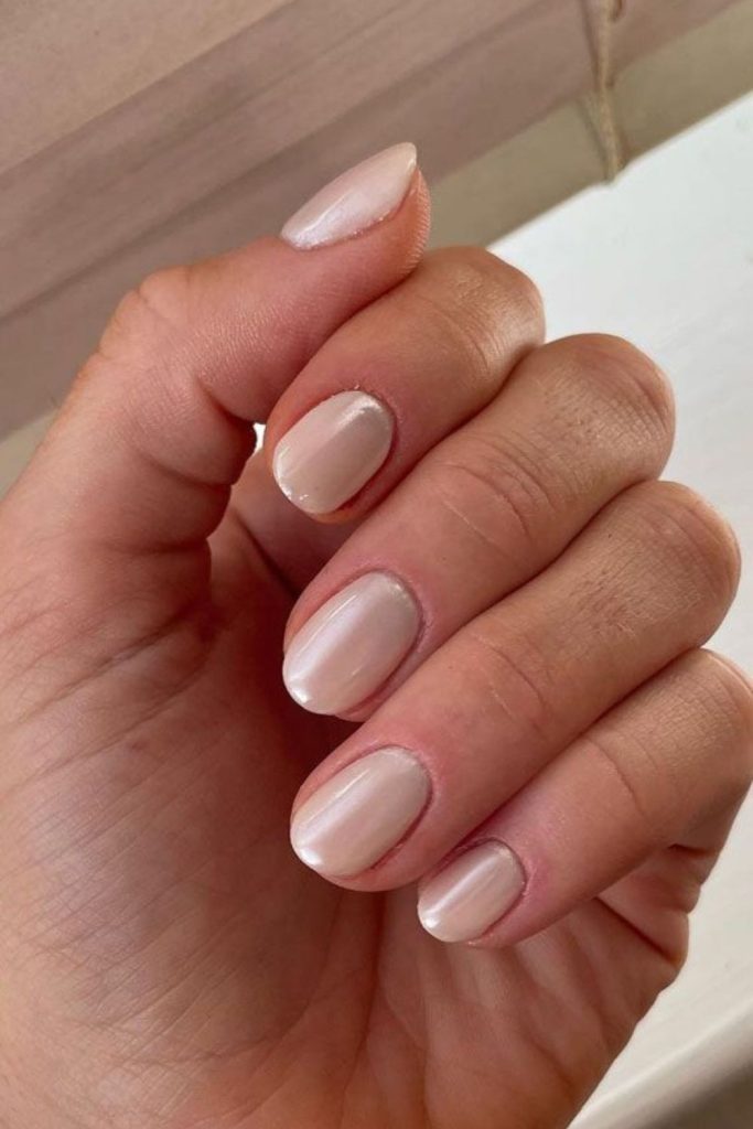 Buttercream yellow toned short nails.