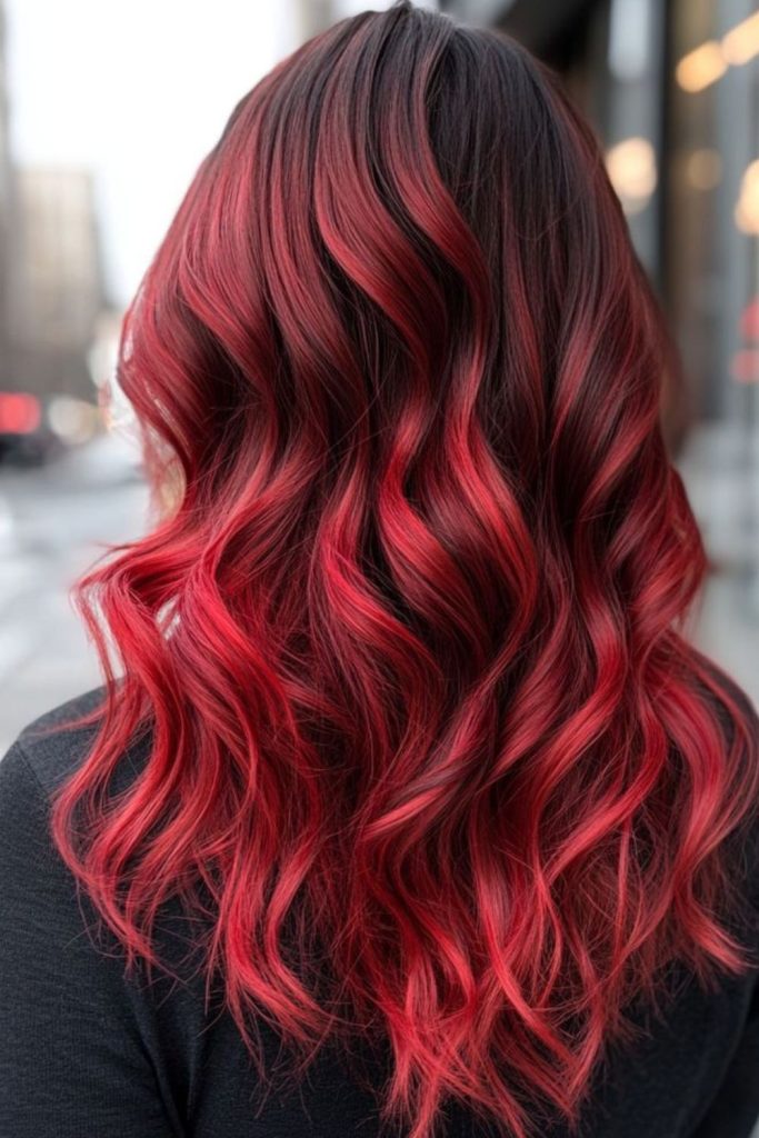 Red ombre cascading curls vibrant