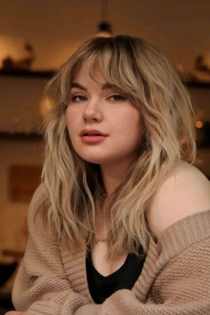 Choppy air bangs create textured style