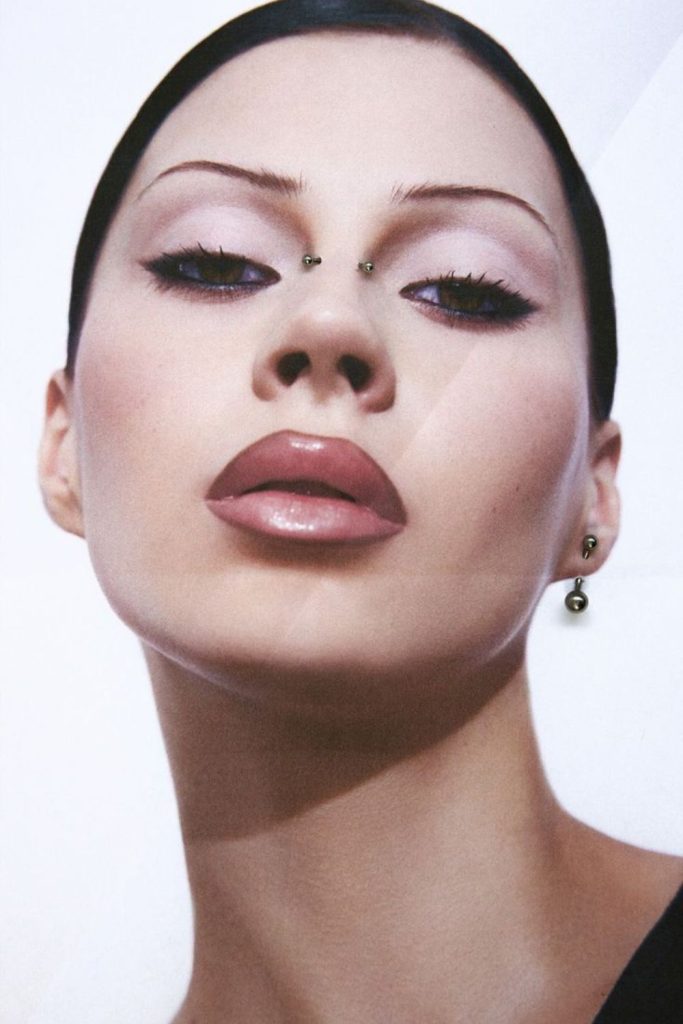 Sculpted thin brows with clean balance