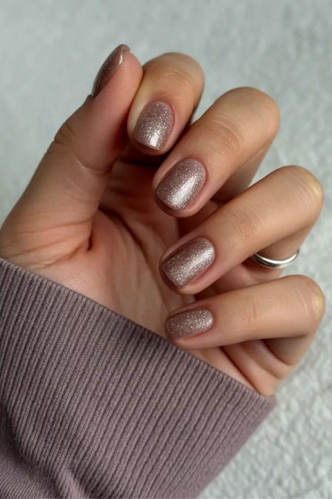 Taupe nails with soft cosmic shimmer