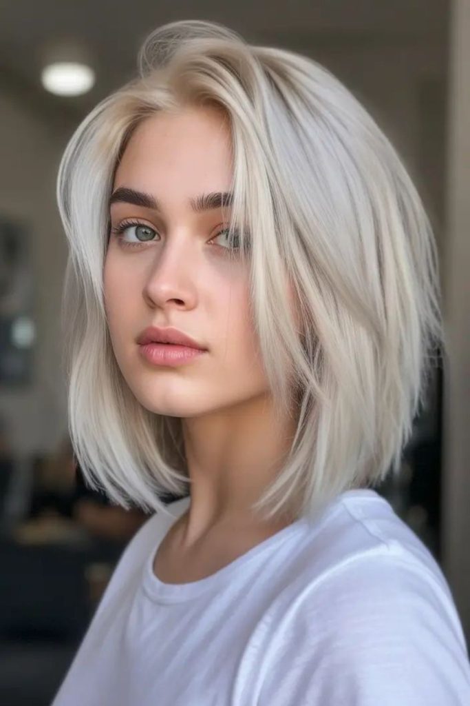 Crescent-flow bob shaping round faces