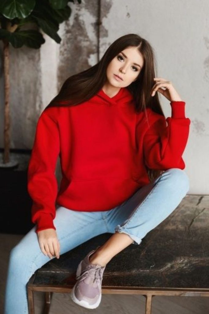 Deep red hoodie with ripped denim