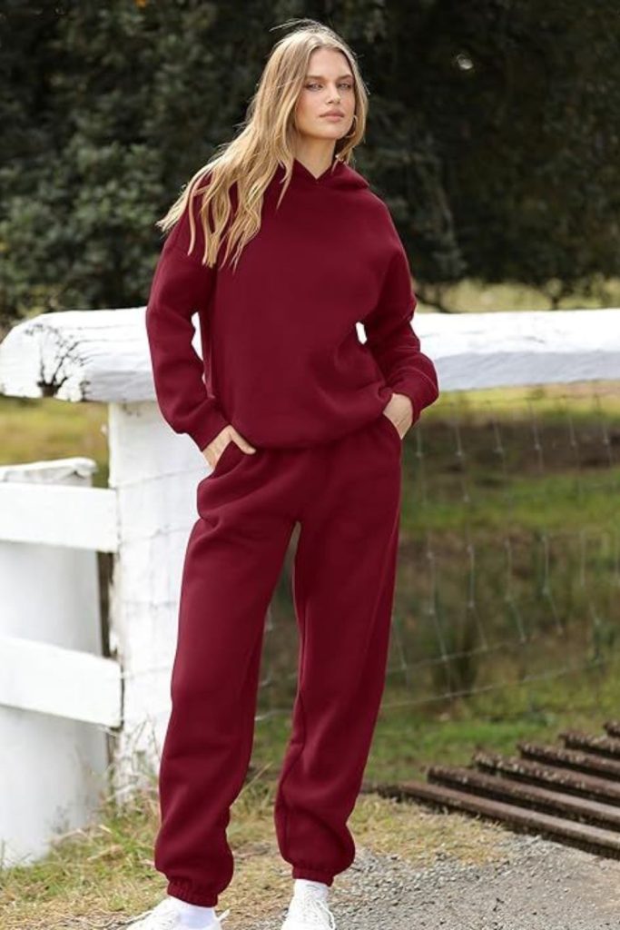 Crimson sweatsuit bold yet cozy vibe.