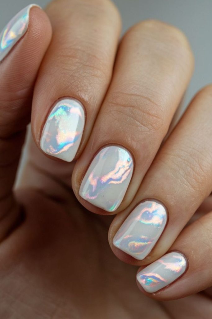 Luminous pearly nails with soft glow