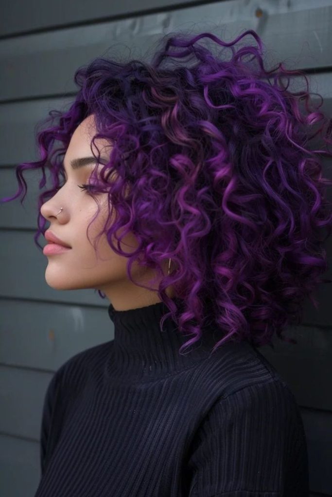 Vibrant violet curls bounce wildly