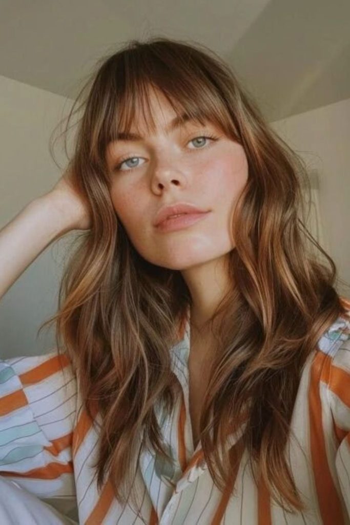 Gentle floating strands around face naturally