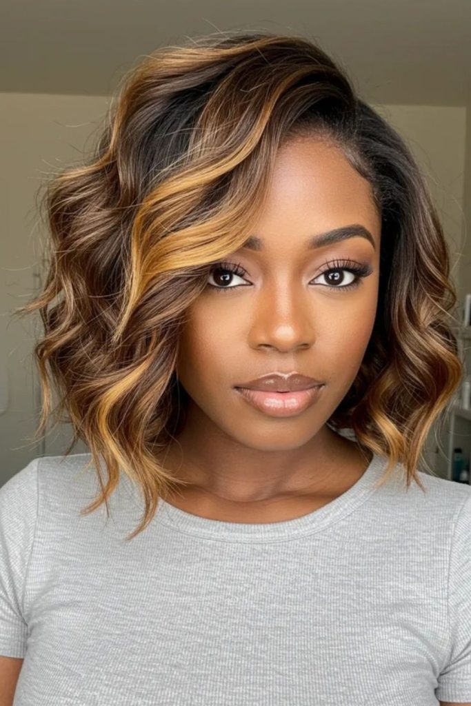 Finger flick waves with golden honey