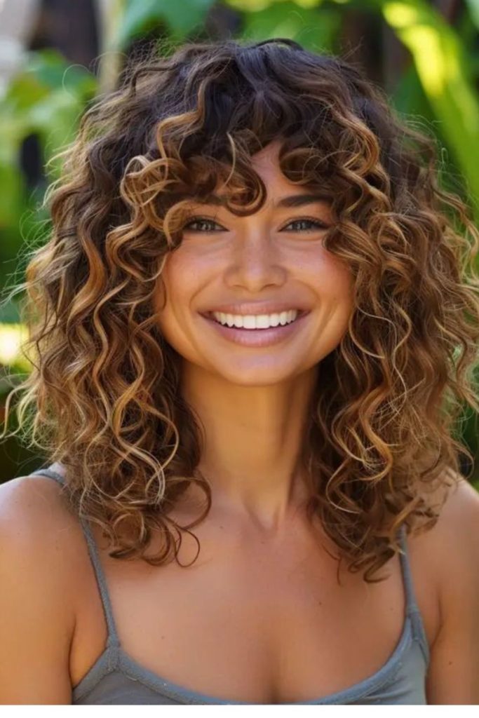 Shag haircut layered with honey highlights