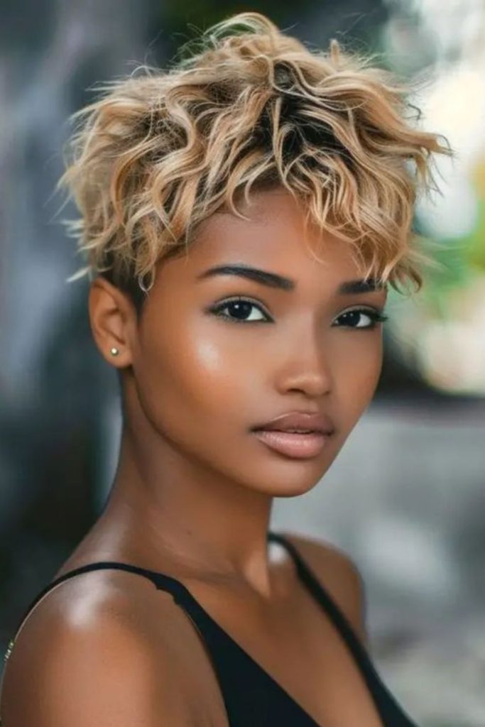 Layered pixie with honey blonde streaks