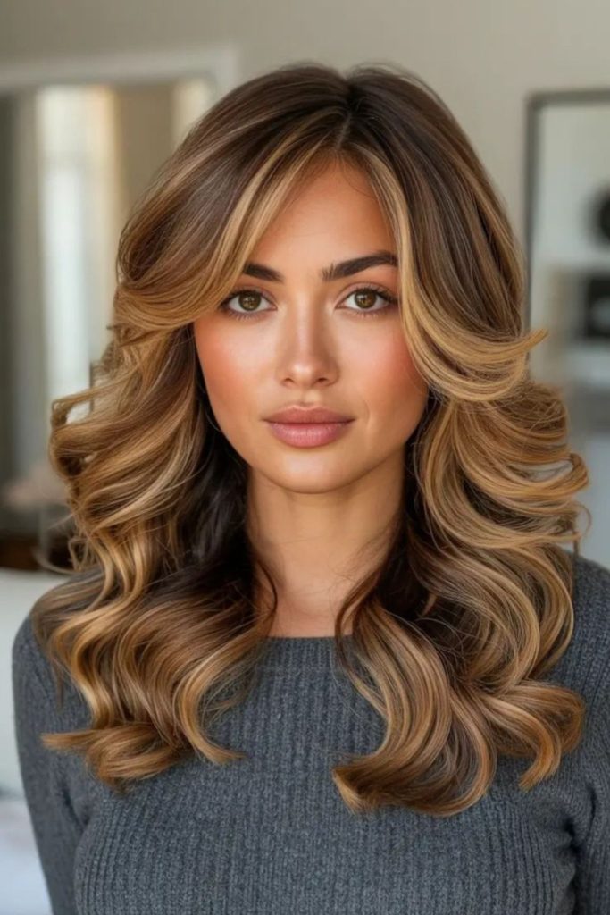 Feathered shag hair with golden highlights.