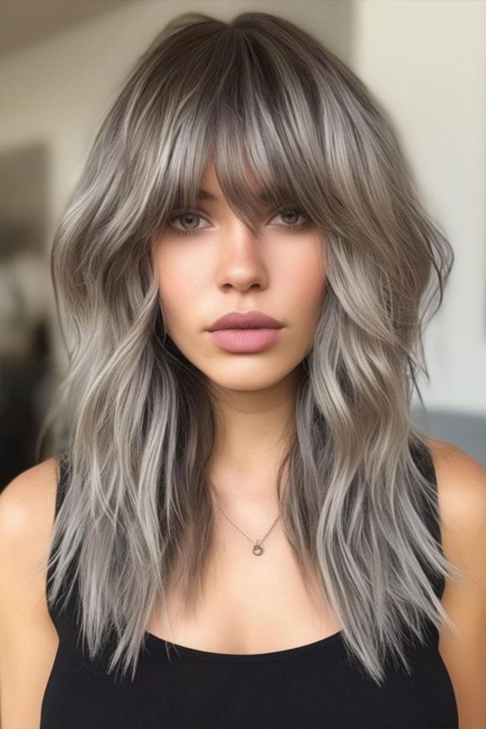 Platinum jagged shoulder-length layered hairstyle