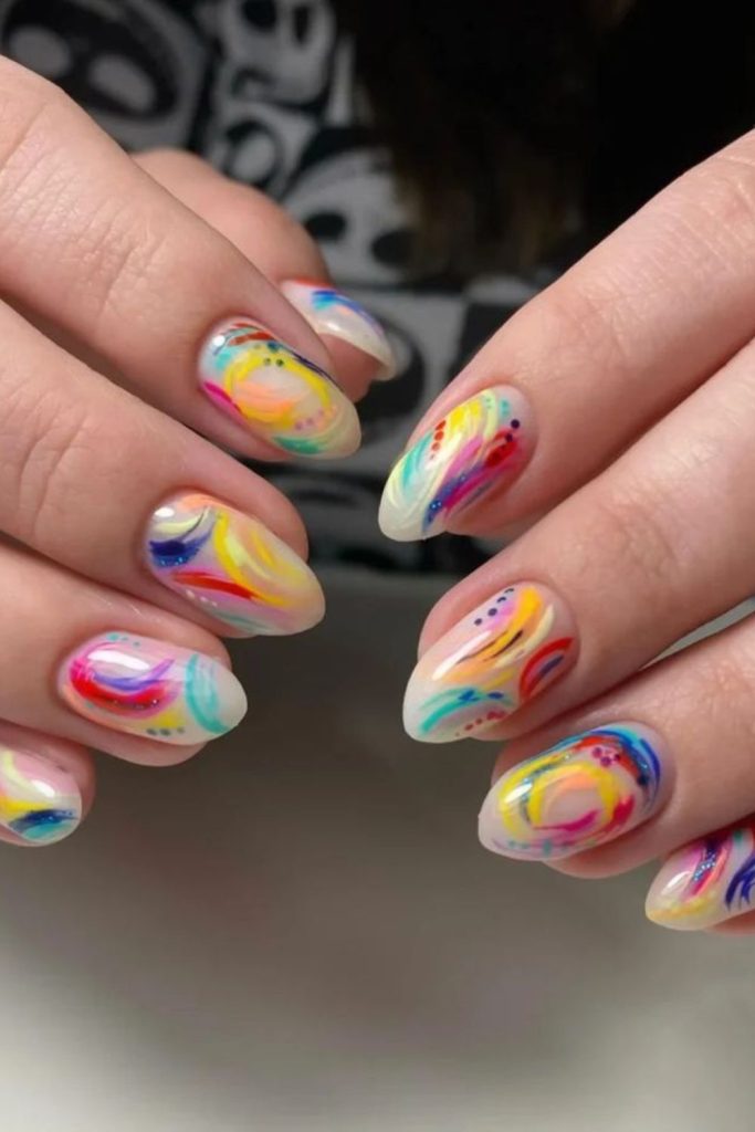 Minimalist nails with tiny icon accents