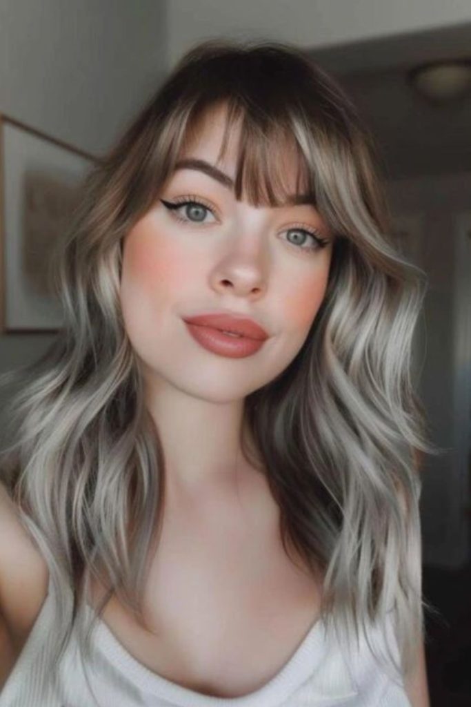 Floating forehead strands with gentle curves