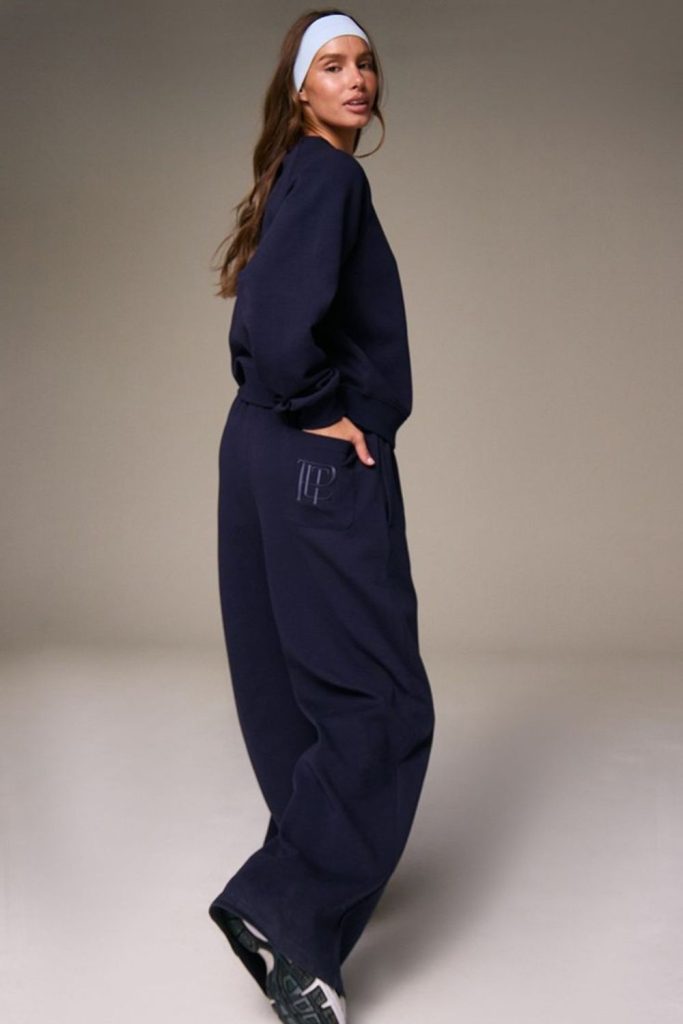 Navy sweatsuit clean casual wear.
