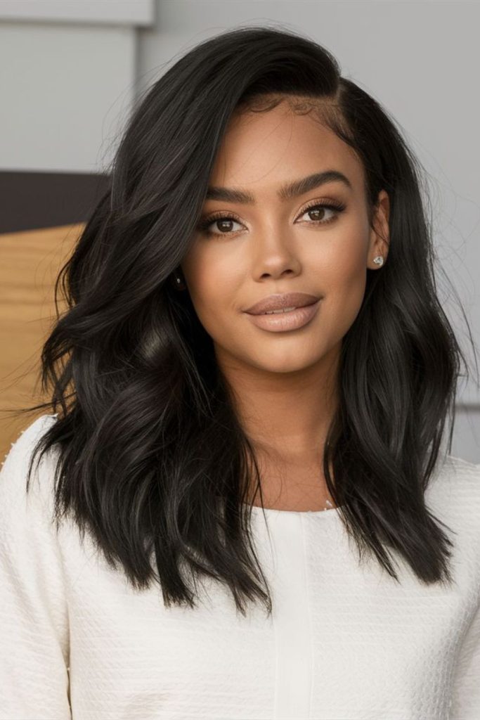 Dramatic nightfall side sweep wig.