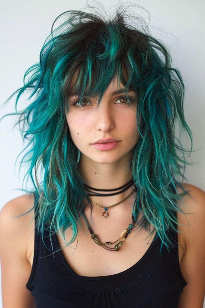 Teal blue layered flowing shag hairstyle.