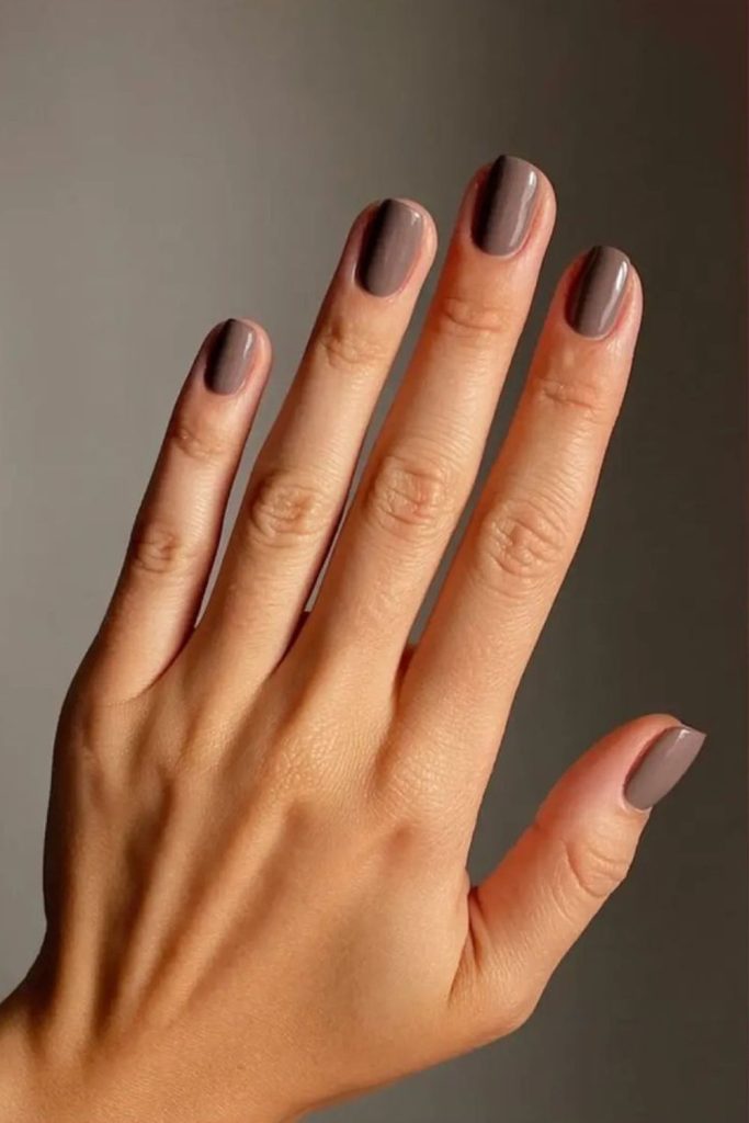 Pale mocha short classy manicure.