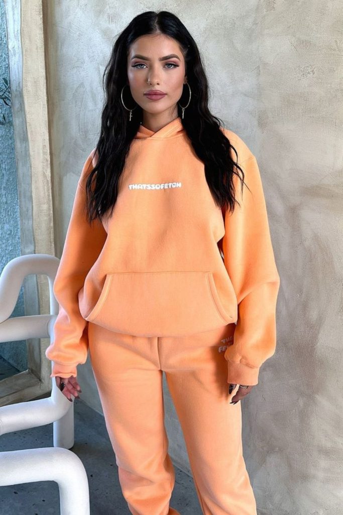 Peach pastel sweatsuit light lounge outfit.