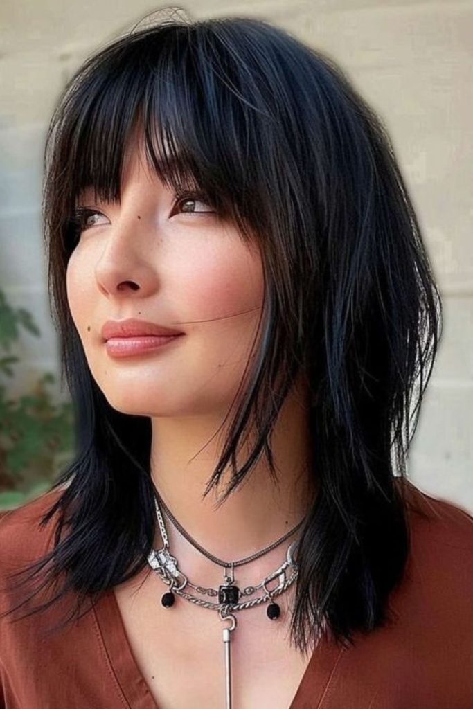 Razor-touched fringe creates edgy texture