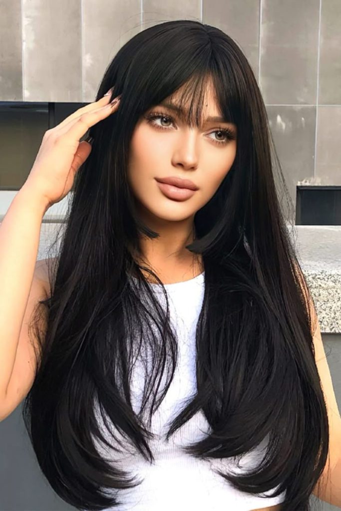 Elegant smooth understated straight hair.