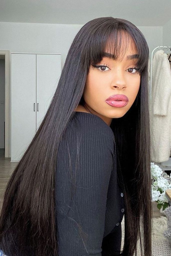 Subtle luxurious smooth straight hair.