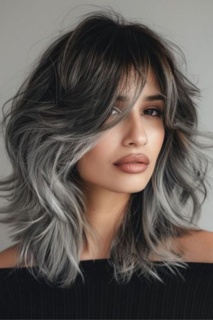 Smoky gray jagged layered hair texture.
