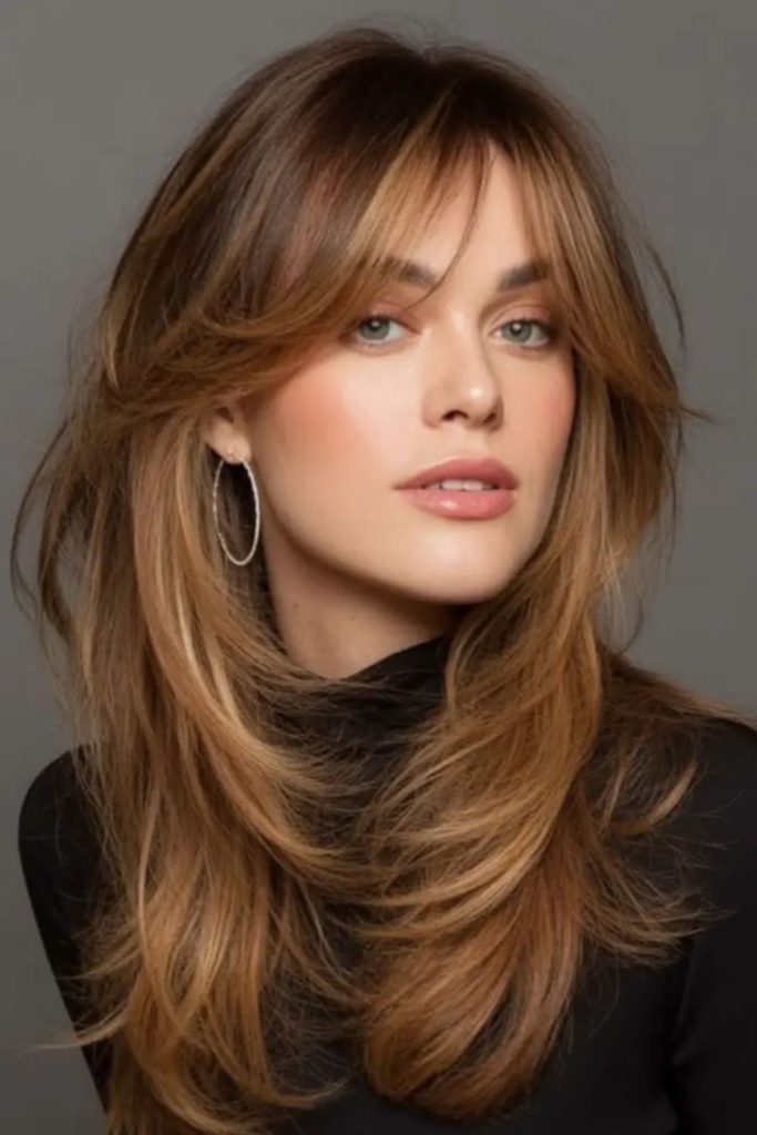 Golden mid-length hair with face-framing shards
