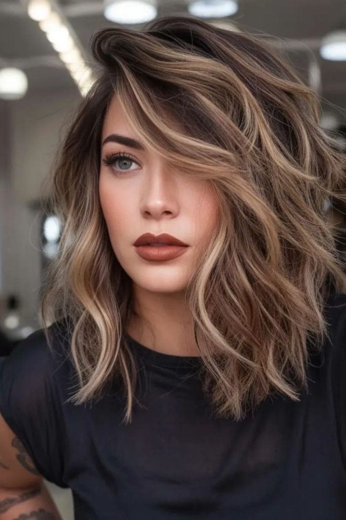 Long bob with toffee-colored layers.