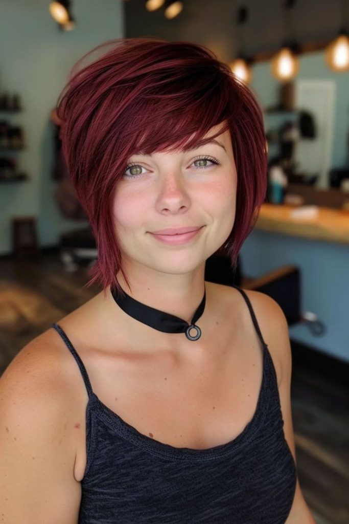 Asymmetrical red hairstyle edgy flair